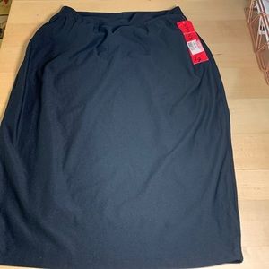 Spanx black skirt tags on size large. Never worn